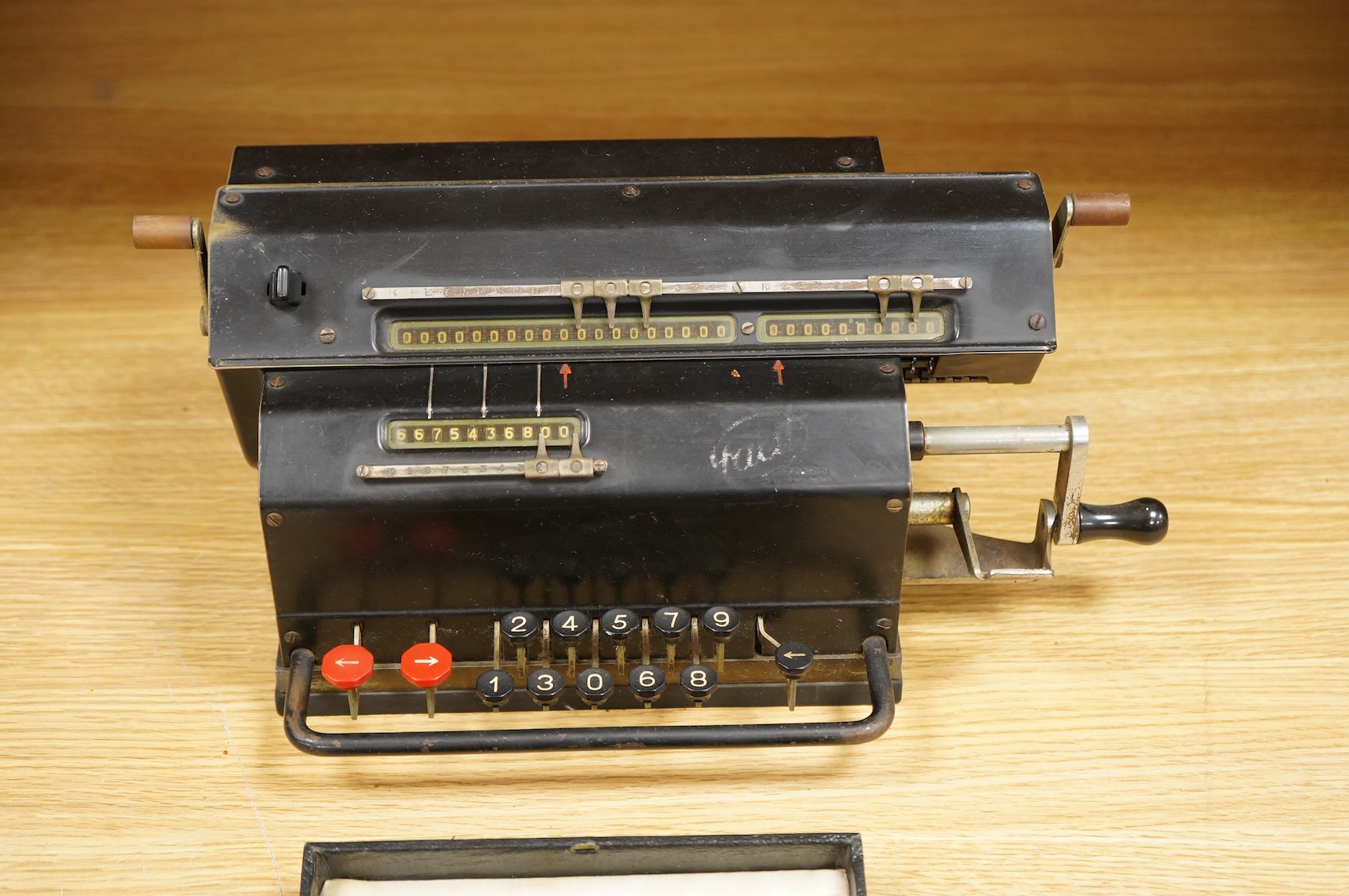 A Swedish Facit mechanical adding calculating machine, together with an Otis King’s calculator, model K, cased, (2).